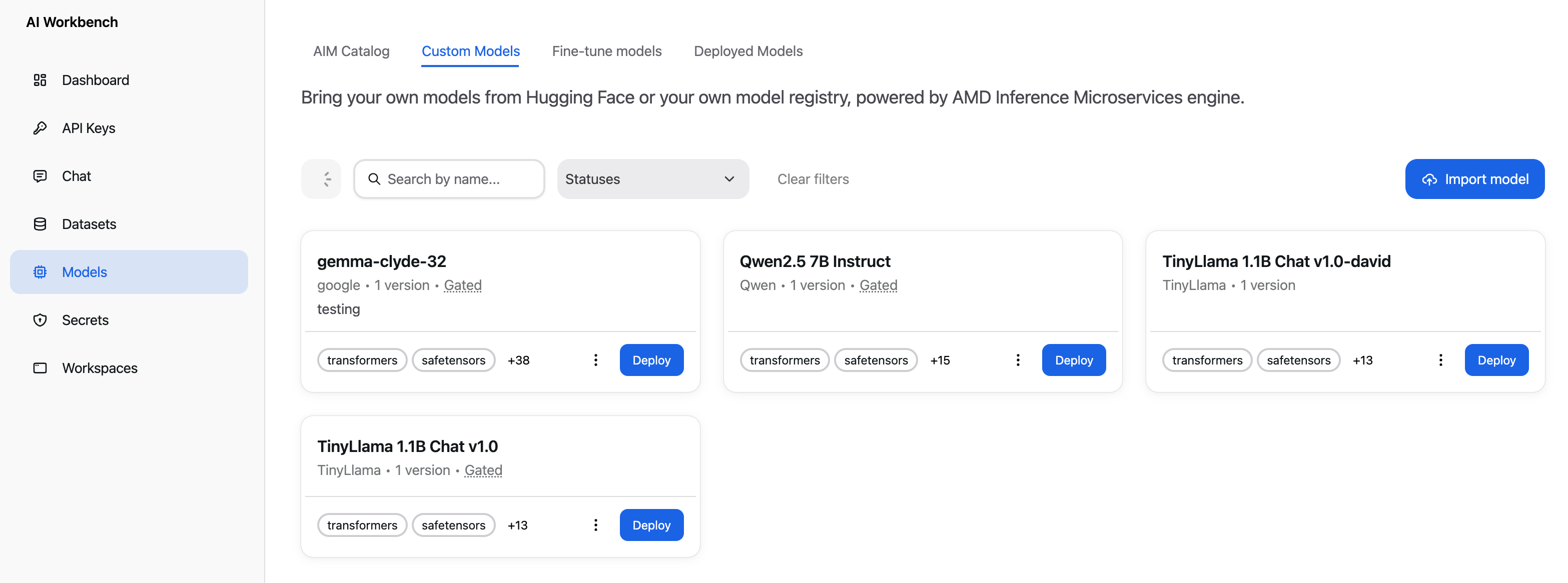 The Custom Models tab listing onboarded models, each with a Deploy button on its card.
